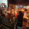 Pawai obor dan takbir keliling warga blok Wuni Desa Dawuan Kecamatan Tengah Tani Kabupaten Cirebon, Minggu (30