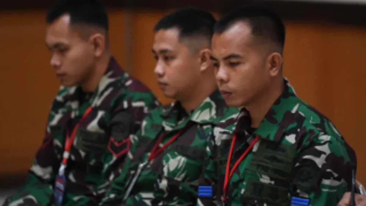 Terdakwa kasus dugaan penembakan bos rental mobil Ilyas Abdurrahman dan penadahan mobil yang merupakan oknum T