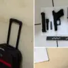 Polisi mengamankan sebuah koper warna coklat berisi amunisi peluru dan senjata api (pistol) di sebuah rumah ko