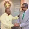 Menteri HAM RI Natalius Pigai (kiri) bersalaman dengan Duta Besar Sudan untuk Indonesia Yassir Mohamed Ali (ka