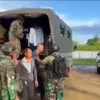 Personel TNI mengamankan sejumlah Warga Negara Asing (WNA) asal Tiongkok ke dalam truk militer di Kabupaten Ke