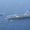 Kapal induk USS Abraham Lincoln dan Angkatan Udara B-52H Stratofortress, melakukan latihan bersama di AS. Wil