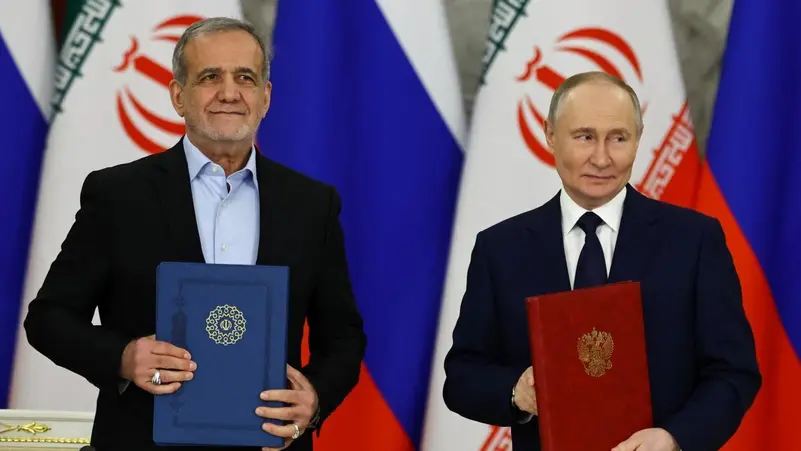 Presiden Rusia Vladimir Putin dan Presiden Iran Masoud Pezeshkian. (Reuters)