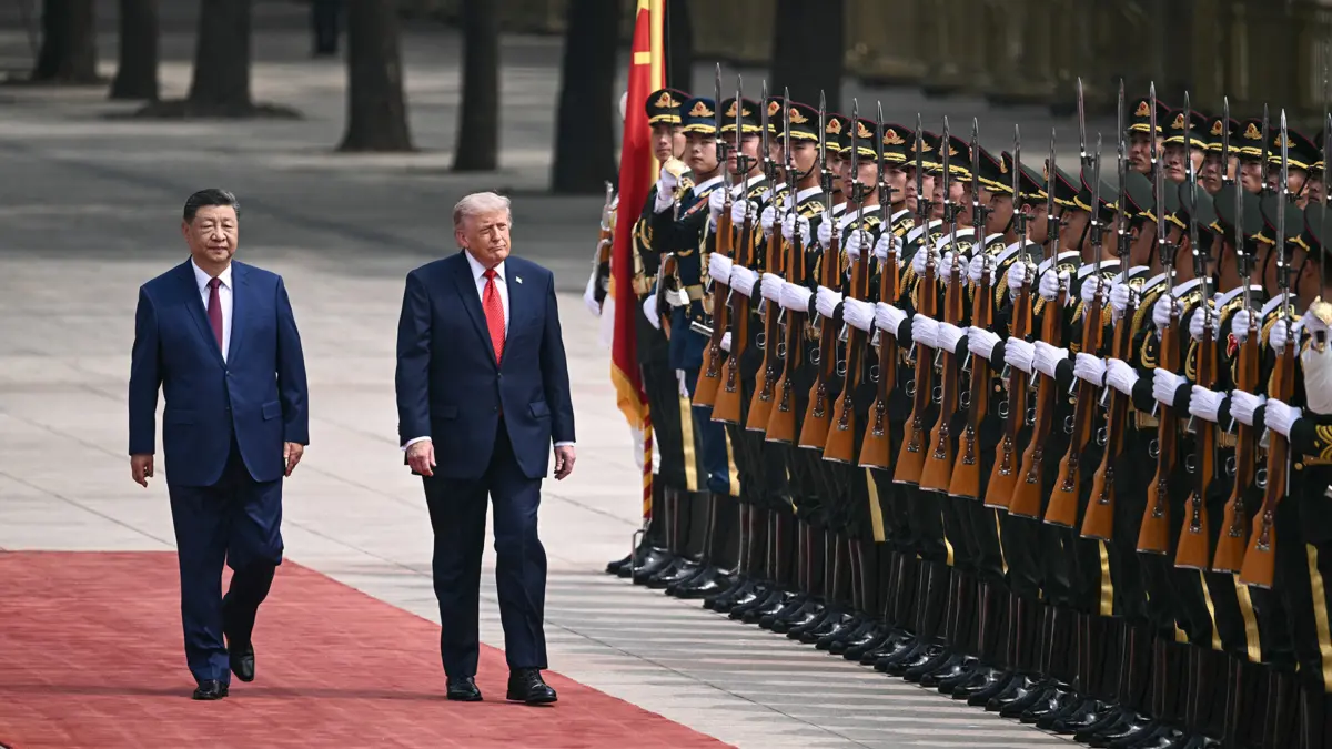 Donald Trump dan Xi Jinping di Balai Besar Rakyat di Beijing pada 14 Mei 2026. (Brendan SMIALOWSKI / AFP melal